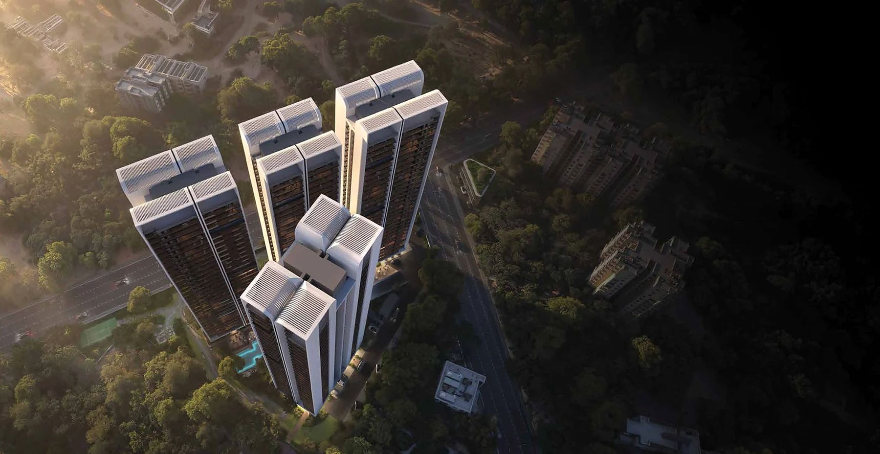 Aerial view of the four towers set in greenery (artistic impression)
